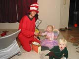 The Cat in the Hat Daddy checking out the loot with the kids